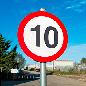 Number 10 road sign used as a metaphor for the warning signs of professional attorney burnout.