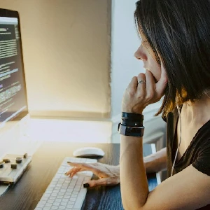 Woman using computer at a desk